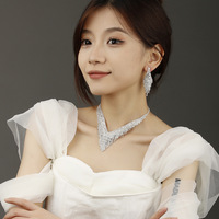 Nouvel ensemble de bijoux de mariage vintage pour femme, accessoires de mariée, collier, boucles d'oreilles et bracelet en cristal et strass argentés