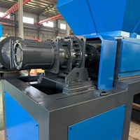 Broyeur industriel à double arbre entièrement automatique modèle 1200, efficace pour le traitement des matériaux en ferraille, bois et carton