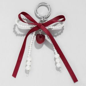 Nouveau Porte-clés et Pendentif de Sac 2025 avec Ruban Rouge Vin, Nœud en Perles d'Imitation et Petit Pendentif Cerise - Product Image 2