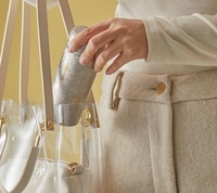 Bouteille portable exquise en titane pur à double couche avec couleur naturelle