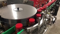 Petite machine d'étiquetage à colle thermofusible linéaire pour l'étiquetage complet des pâtes de bœuf en conserve
