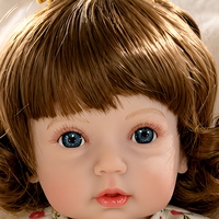 Poupée réaliste Reborn de 22 pouces en vinyle, poupée nouveau-né à la mode, cheveux bruns, yeux bleus, barboteuse florale