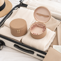 Sac de rangement pour flacons d'huiles essentielles en cuir PU rond de grande capacité, trousse de toilette portable à fermeture éclair pour femmes