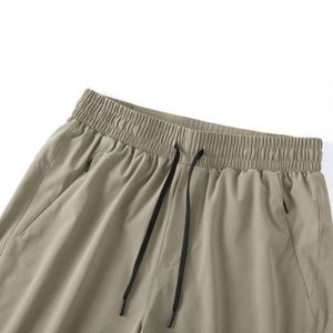 กางเกงวิ่งมาราธอนแห้งเร็วสำหรับผู้ชายพร้อมซิปและกระเป๋าหลังเอว - ดีไซน์สำหรับกีฬาแบบมืออาชีพสำหรับการฝึกซ้อม - Product Image 2