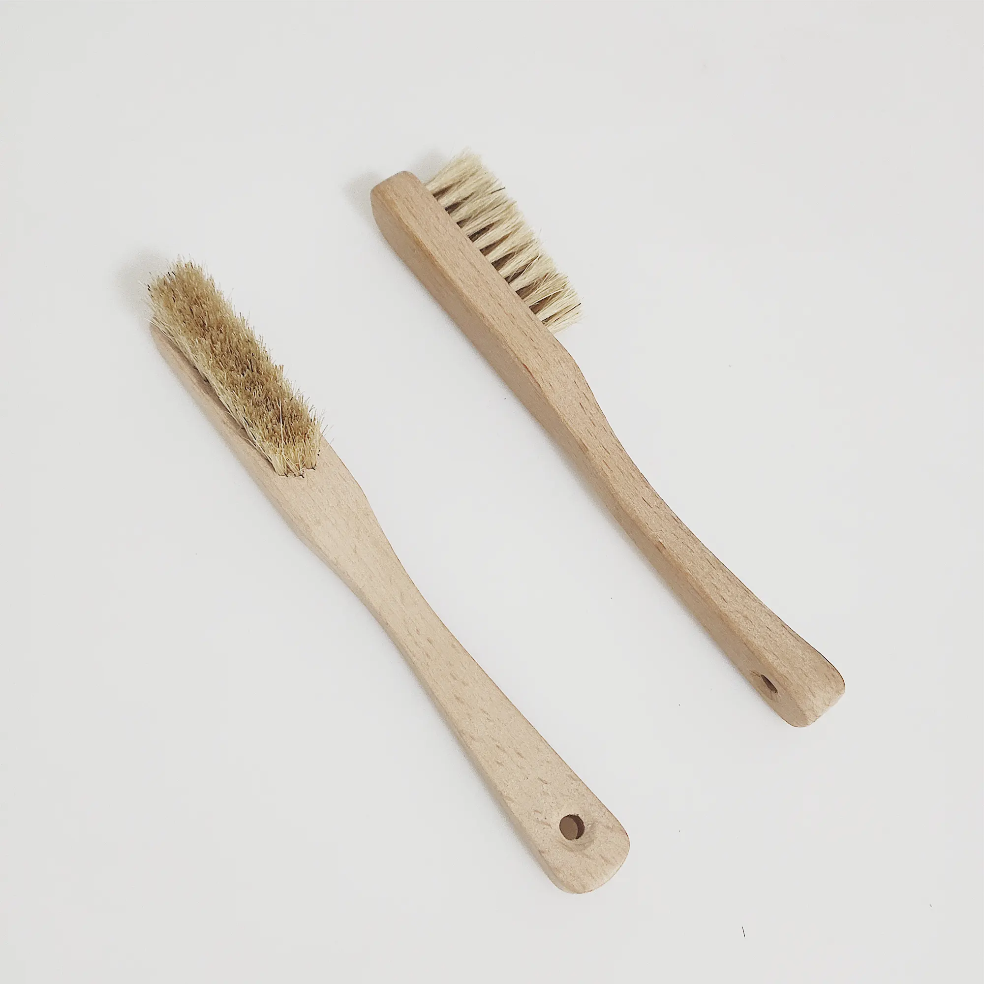 Natural bristle clothes brushes