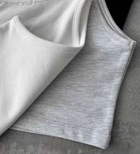 Camiseta sin mangas de algodón transpirable para mujer, diseño personalizado, compra al por mayor, con cuello redondo liso y logo frontal, ideal para gimnasio. - Product Image 5