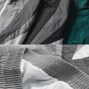 เสื้อแจ็คเก็ตผู้ชายสไตล์ลำลองสำหรับฤดูใบไม้ร่วง แบบกันน้ำ กันลม ระบายอากาศได้ดี ผ้าโพลีเอสเตอร์ยับๆ แต่งสีสันแบบ Color Block ตัดต่อผ้าแบบ Patchwork ซิปหน้า - Product Image 6