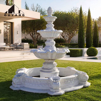 Maßgefertigter Klassischer 3-Stufiger Granit-Steinbrunnen mit Verzierter Relief-Schnitzerei für Villa, Hinterhof und Gartendekoration