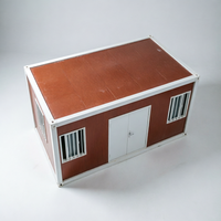 Maison modulaire en conteneur avec structure en acier robuste et fenêtres sécurisées pour le logement d'un bureau de chantier