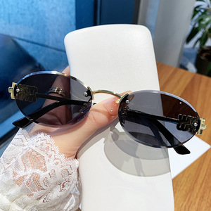 Oval Frameless <b>Sunglasses</b> Black PC Lens UV400 Unisex Fashion Style - Product Image 1