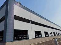 Atelier de structure métallique à assemblage rapide Bâtiment de structure métallique de hangar industriel en acier à faible coût