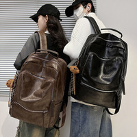 Sac à dos d'étudiant grande capacité, en cuir PU, version coréenne, sac de voyage décontracté pour homme, sac à dos rétro, sac pour ordinateur