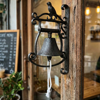 Sonnette murale décorative vintage en fonte en forme d'oiseau pour jardin, porche, entrée