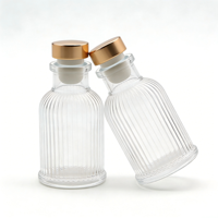 Bouteille diffuseur d'arômes en verre transparent rond vide de 50 ml avec logo personnalisé pour salle de bain