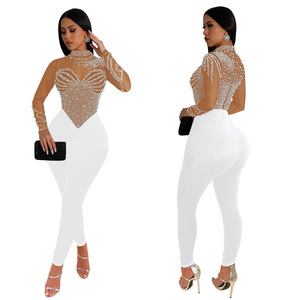 Vente en gros de combishorts de couleur unie à col haut pour femmes en stock combinaison de luxe perlée pour soirée en club pour filles - Product Image 5
