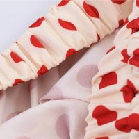 Nouvelle Robe Mini Tube Vintage Française en Satin à Pois Coupe Slim Sans Bretelles Été 2026
