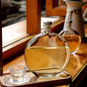 ผู้ผลิตขวดแก้วแบบแบนทรงกระบอก ขนาด 300 มล. 500 มล. สำหรับใส่เหล้าวอดก้า XO พร้อมฝาปิด - Product Image 4