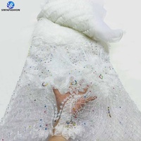 Tissus en dentelle à paillettes et perles 3D de haute qualité pour robe de mariée de fête pour femmes, design de fleurs en applique 3D 2026