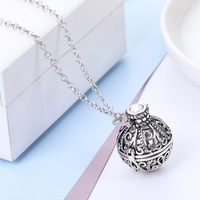 Collier pendentif vintage en forme de cage creuse, diffuseur d'huiles essentielles d'aromathérapie, avec pierre de lave et boule de coton