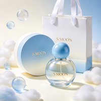Nouvelle conception, flacon de parfum en verre mignon de 50 ml et 100 ml avec bouchon à bille coloré et boîte, flacon en verre vide personnalisé de 30 ml et 75 ml pour parfum