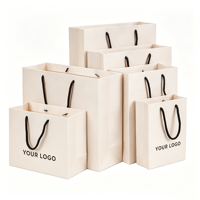 Sacs en papier personnalisés pour magasins de vêtements avec poignées pour cadeaux, shopping et souvenirs, sacs avec logo/sacs cadeaux avec logo/sacs avec logo personnalisé
