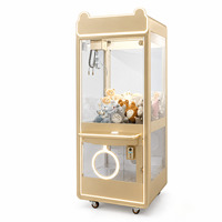 Machine à griffes d'arcade professionnelle en métal robuste, avec vitrine transparente à vue complète, éclairage rond et sortie de tombola lumineuse, à monnayeur