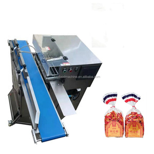 Máquina Empacadora de Pan Tostado y Muffins con Cinta de Atado, de Alto Rendimiento y Ahorro de Mano de Obra, al Mejor Precio - Product Image 1