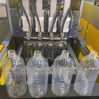 Petit souffleur de bouteille d'eau en plastique PET à 4 cavités à grande vitesse entièrement automatique faisant la machine de moulage par soufflage Chine