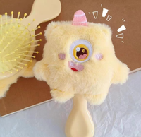 Nouveau peigne coussin d'air en peluche en forme de monstre. Peigne mignon au charme féminin. Doux et délicat. Mini peigne portable.
