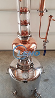 Appareil d'extraction à la vapeur compact pour la préparation d'huiles essentielles pures et de distillat d'eau de rose