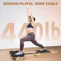 Machine d'entraînement Pilates Reformer portable sur mesure de haute qualité, avec plateau en bois haute densité, légère et pliable pour usage domestique et commercial