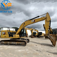 Excavatrice sur chenilles Caterpillar 323GC d'occasion de taille moyenne avec cabine d'origine
