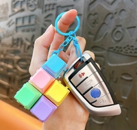 Porte-clés anti-stress en forme de macaron, détachables et assemblables librement, pour la réduction du stress (vente en gros)