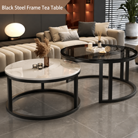 Table basse ronde moderne de style nordique avec plateau en pierre, structure métallique, rangement, mobilier de salon de luxe léger