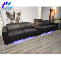 IEasy Schwarzes Rindsleder Verstellbare Kopfstütze Couch Relaxsessel Elektrischer Relaxsessel Ecksofa Elektrisches Relaxsofa-Set mit Tisch