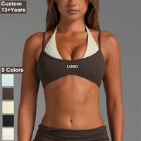 Nouveau soutien-gorge de yoga populaire pour femmes avec sangle intégrée au cou, style deux pièces, bretelles réglables, soutien-gorge de sport et haut de fitness bicolore