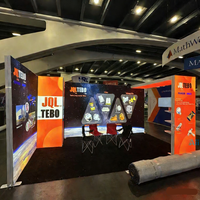 Stand d'exposition personnalisé avec boîte lumineuse publicitaire, système modulaire 10x20 pieds, double comptoir d'accueil, stand d'exposition personnalisé