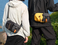 Sac banane tendance en nylon à blocs de couleur avec double compartiment, poche à cordon et à boucle, et sangle réglable
