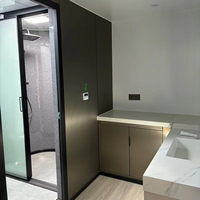 Conteneur de capsule spatiale moderne pour villas et petites maisons Cabine de petite maison mobile personnalisée Conteneur de cabine Apple pour hôtel