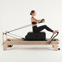 Appareil de Pilates haut de gamme personnalisable en bois d'érable avec résistance réglable, idéal pour les studios de Pilates, vente directe d'usine