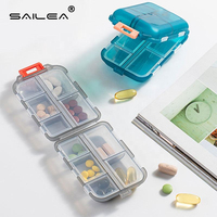 Boîte à pilules de voyage pliable écologique personnalisée à 10 compartiments, mini-organisateur de comprimés en plastique durable en PP, forme unique