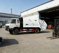 Camion compacteur à ordures Dongfeng 4X2 diesel manuel de 8 à 12 mètres cubes avec pompe et moteur en stock
