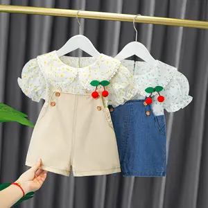 गर्मियों में बच्चों बच्चों पुष्प प्रिंट चेरी गुड़िया कॉलर लघु आस्तीन ब्लाउज में सबसे ऊपर है + चौग़ा पंत कपड़े सेट बेबी लड़कियों 2pcs सूट