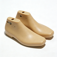 Nouvelles sandales plates ajustables anti-déformation en plastique pour femme, style mules, avec embauchoirs intégrés