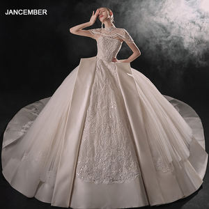 فستان زفاف فاخر للنساء من الدانتيل والستان بدون حمالات موديل 2024 مع قطار مزين بفيونكة بوليرو فساتين زفاف نسائية أنيقة موديل Lsmx063 - Product Image 2