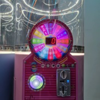 Distributeur d'oeufs torsadés personnalisé Machine de type grue à pièces Machine de jeu d'arcade à plateau tournant pour enfants