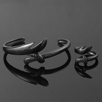 Ensemble de bijoux vintage plaqué noir, style européen et américain occidental, bracelet et bague en acier inoxydable