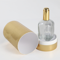 Boîte d'emballage de bouteille de parfum de luxe de conception imprimant la boîte ronde de papier de carton de cylindre