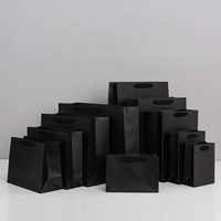 Sacs de shopping en papier noir de luxe personnalisés avec logo imprimé pour chaussures et vêtements