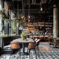 Ensemble de meubles de restaurant Ron Group Luxury Custom Leather Solid Wood Black Booth Seating, comprenant des chaises et une table en cuir et bois massif.